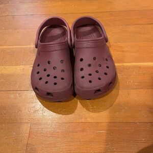 Size 8 Women’s Crocs Color is Plum/Wine